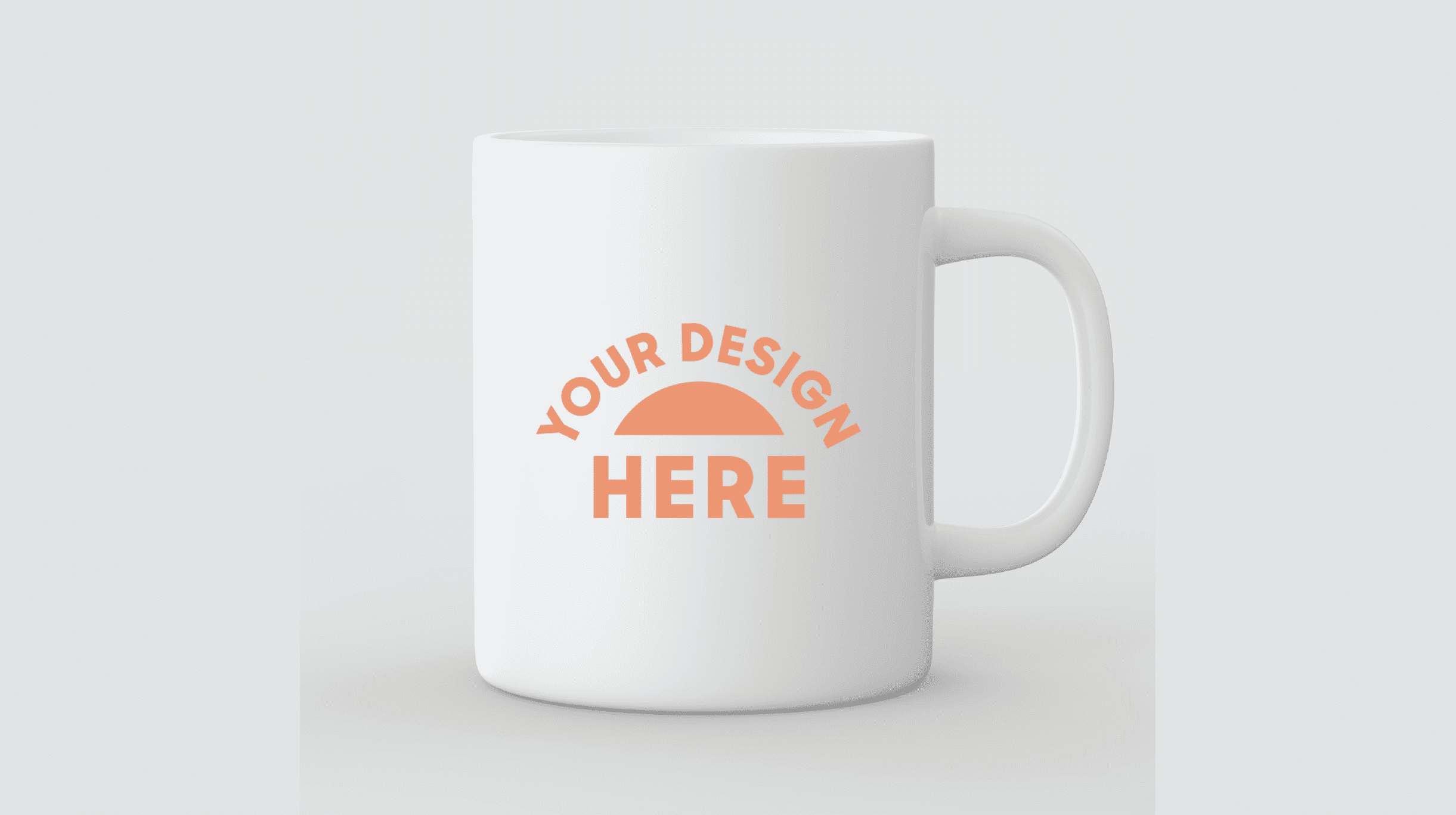 "Premium white ceramic coffee mug mockup with a personalized peach color logo placeholder that says 'YOUR DESIGN HERE' centered on a clean light grey studio background."