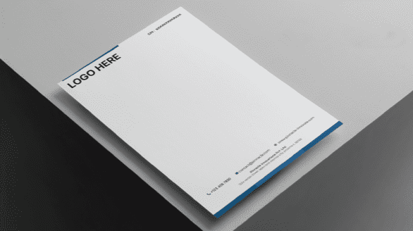 "Premium custom printed official business letterhead template displayed at an angle, featuring a clean white layout with a solid blue top border accent, a 'LOGO HERE' placeholder, and lower footer icons."