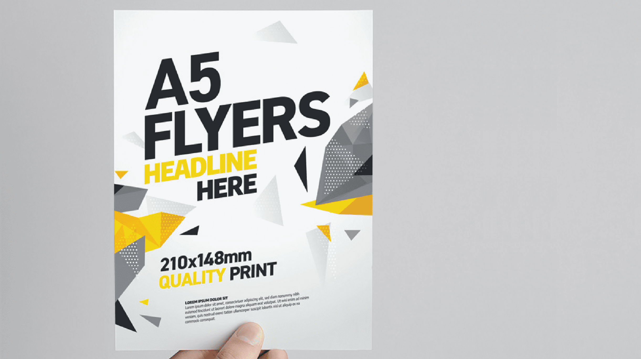 "Custom printed A5 promotional flyer template featuring a modern low-poly geometric design with sharp yellow, grey, and black triangles on a clean white background."