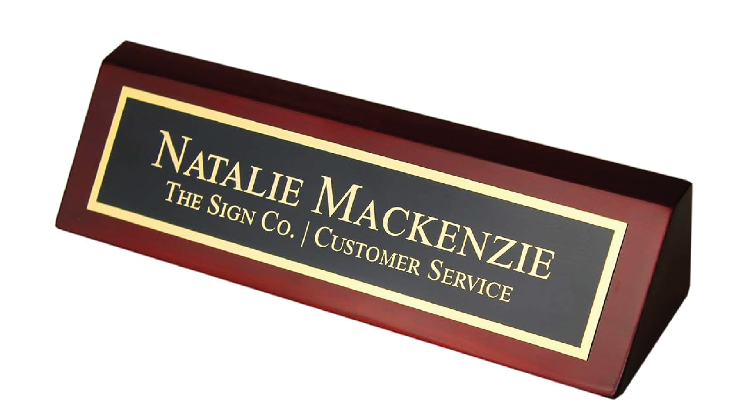 "Premium rosewood desk nameplate with an engraved black and gold brass plate for Natalie Mackenzie."