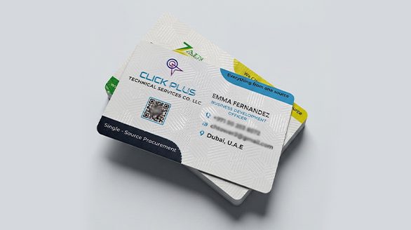 "An isometric view of a stack of premium corporate business cards featuring the Click Plus Technical Services Co. LLC logo, employee contact details, a QR code, and a subtle textured line pattern overlay."